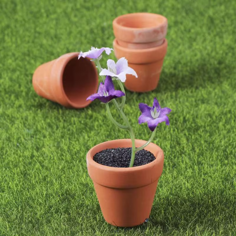 Pot de fleur en poterie rouge