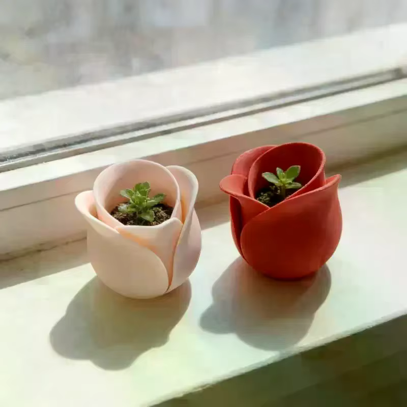 Pot de fleurs en forme de rose