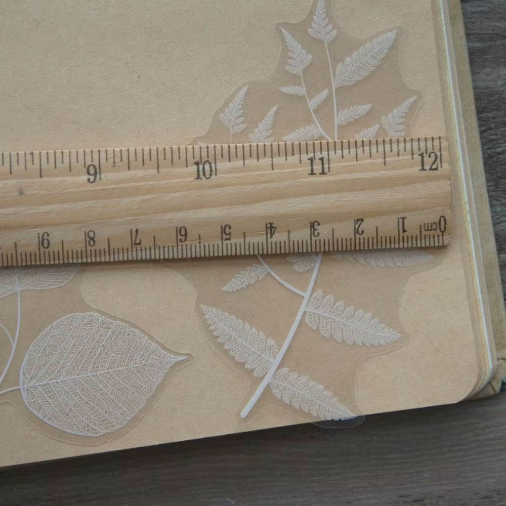 Autocollants en forme de feuilles blanches