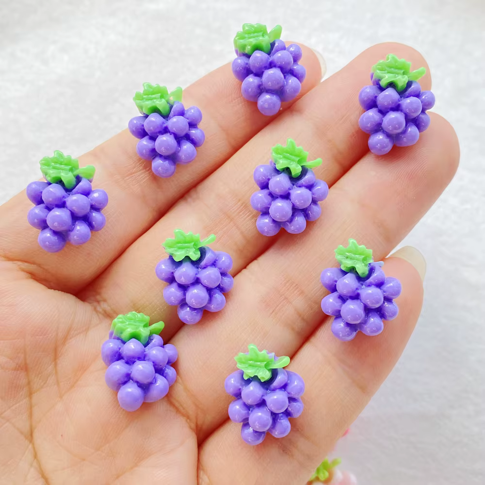 Raisins de fruits mignons en résine vibrante