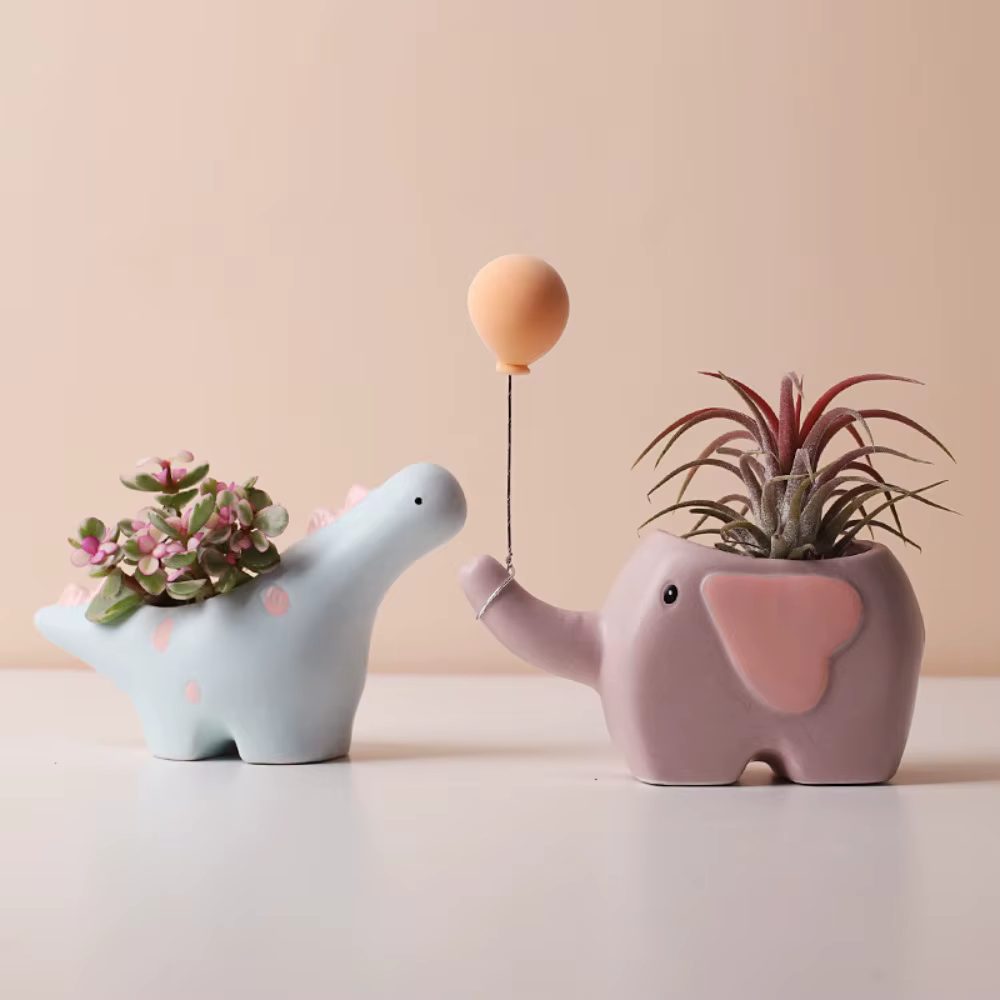 Pot de fleurs en céramique en forme d'éléphant