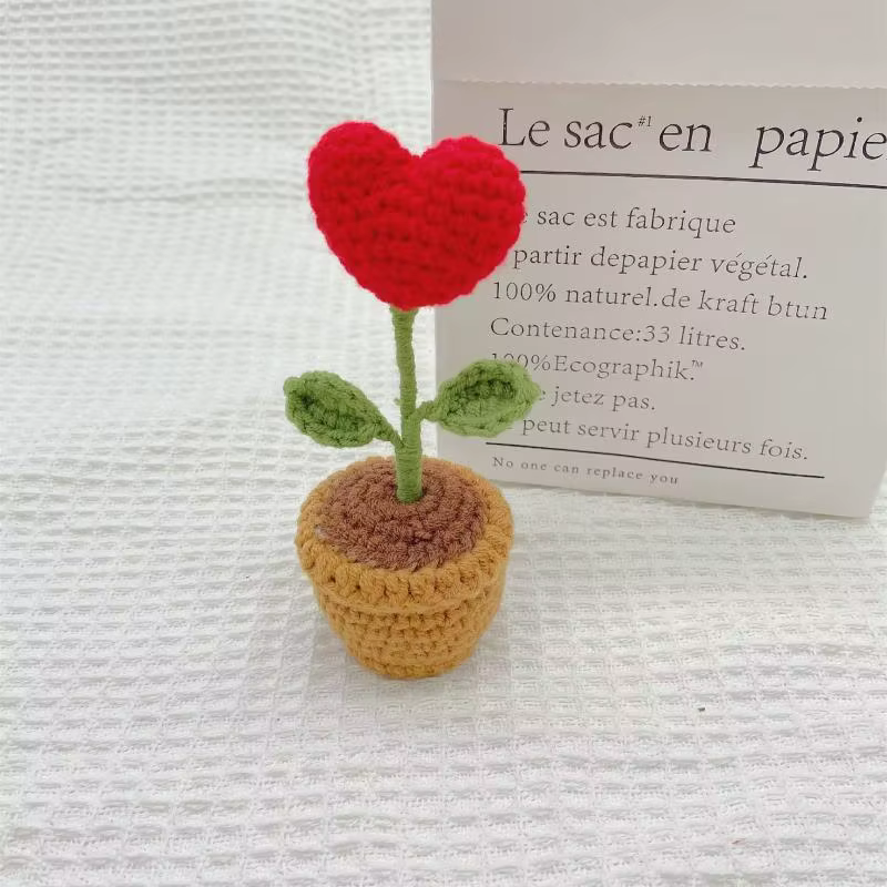 Petite plante en pot tissée à crochet
