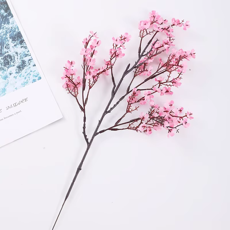 Fleurs artificielles roses