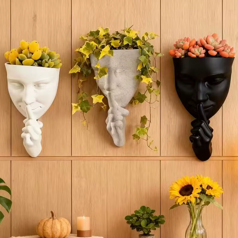 Pot de fleurs mural artistique en forme de visage