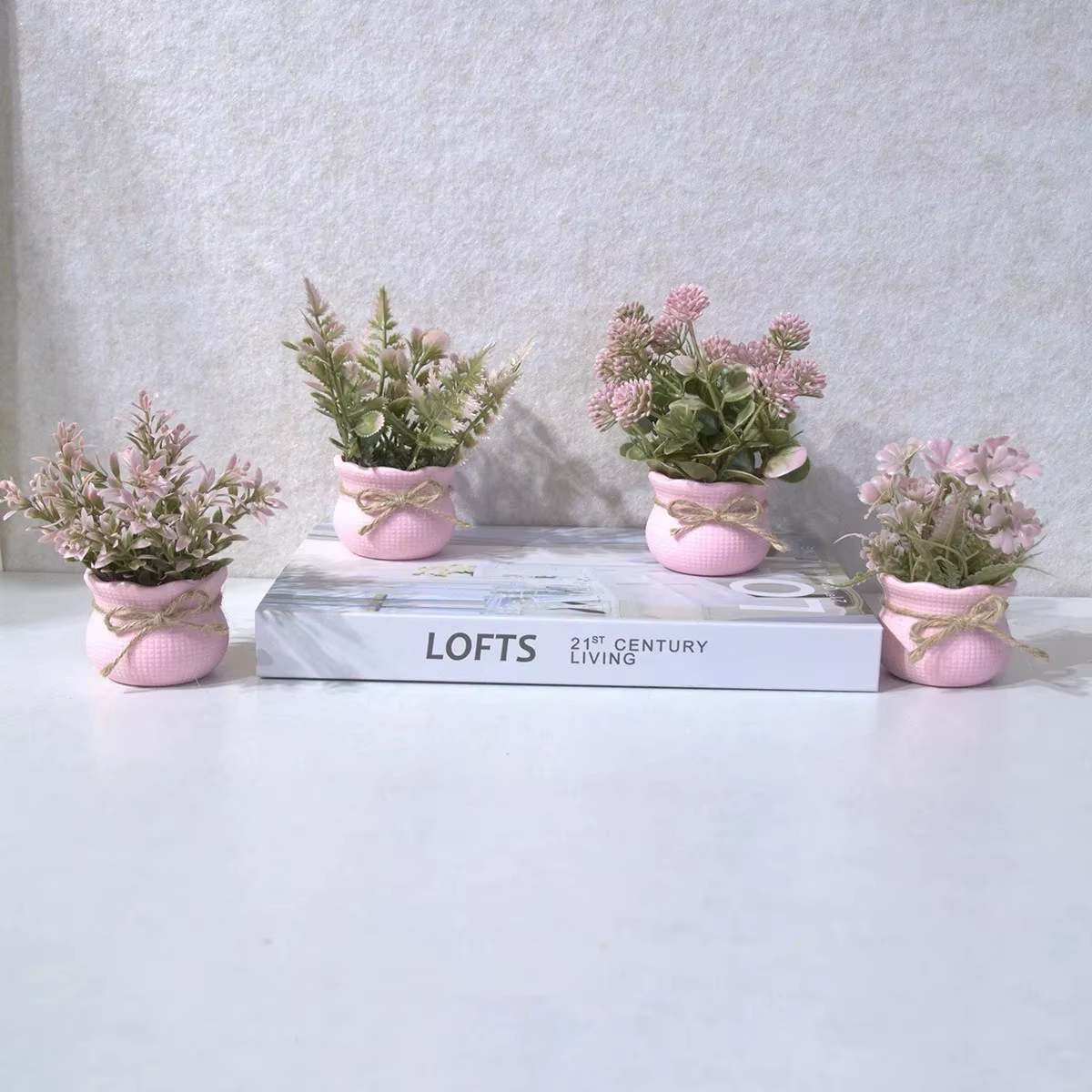 Mini-fleurs artificielles roses en pot