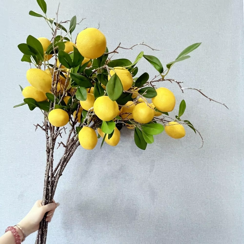 Branche de citron artificielle à feuilles vertes