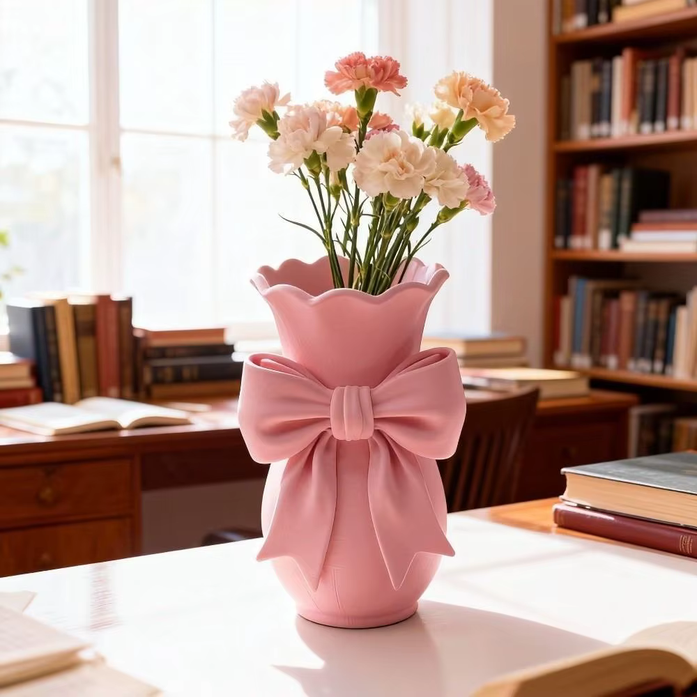 Vases à fleurs en forme de nœud rose au design torsadé