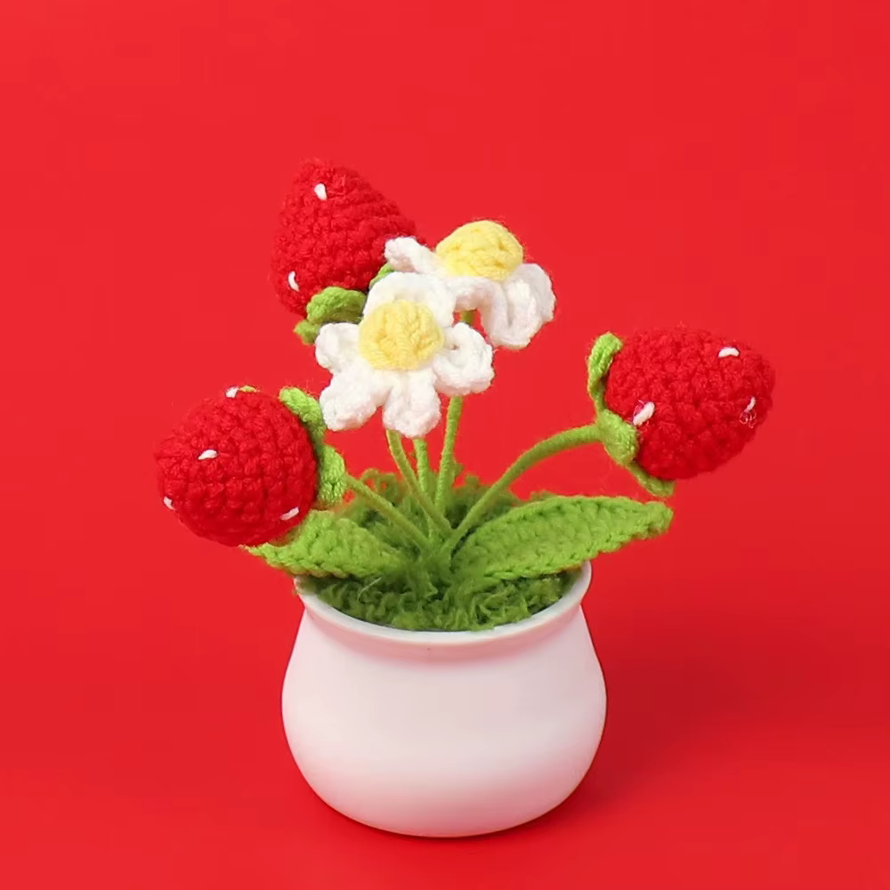 Fleur tricotée en forme de fraise