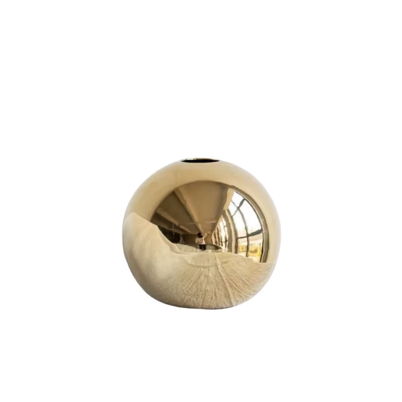 Vase sphérique en céramique argenté par électrolyse