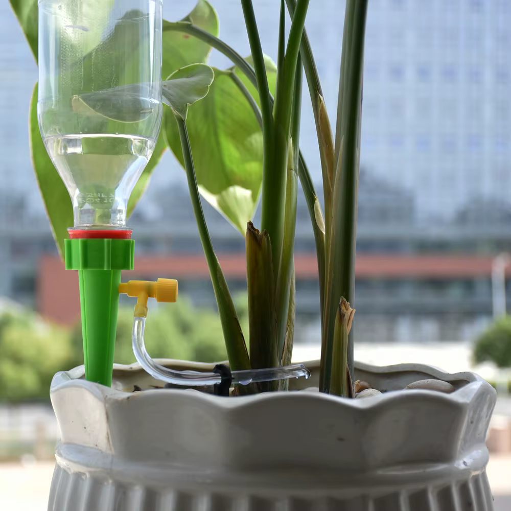 Système d'arrosage automatique pour pots de fleurs