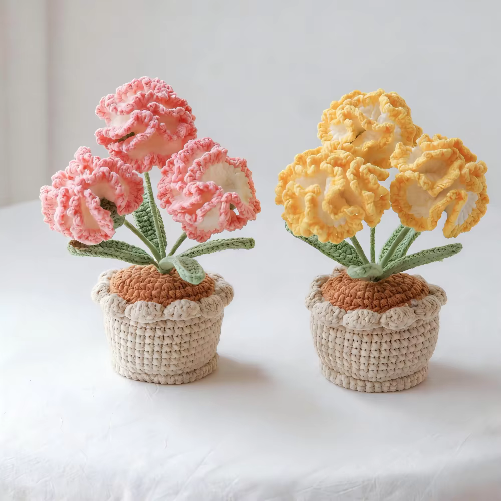 Plante en pot de carnations en laine crochetée à la main
