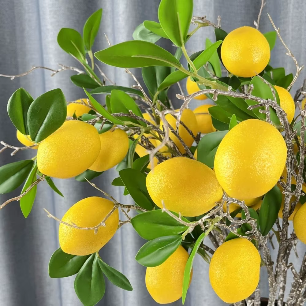 Branche de citron artificielle à feuilles vertes