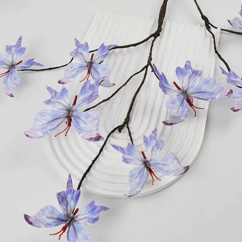 Branches de fleurs artificielles en forme de papillon