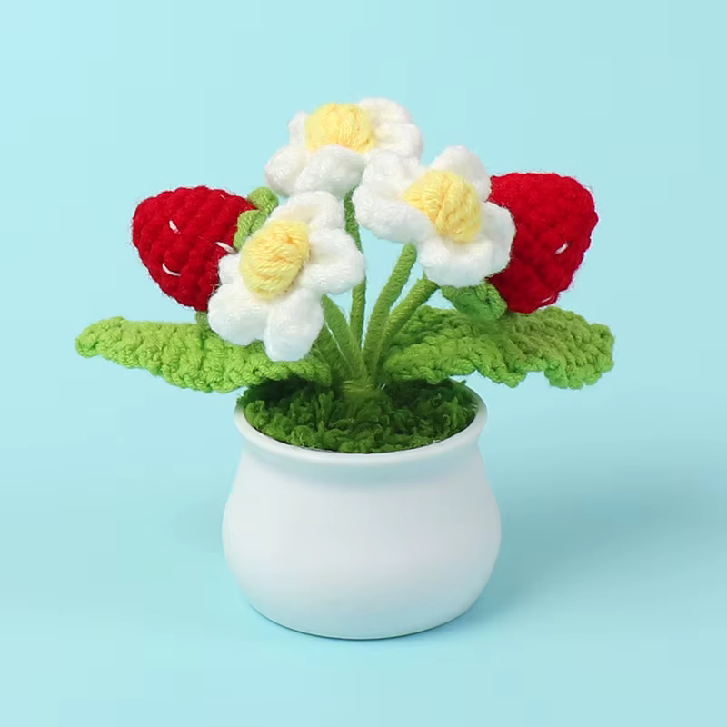 Fleur tricotée en forme de fraise