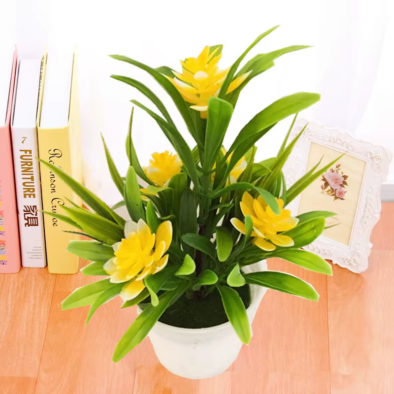 Pot de plantes à fleurs artificielles