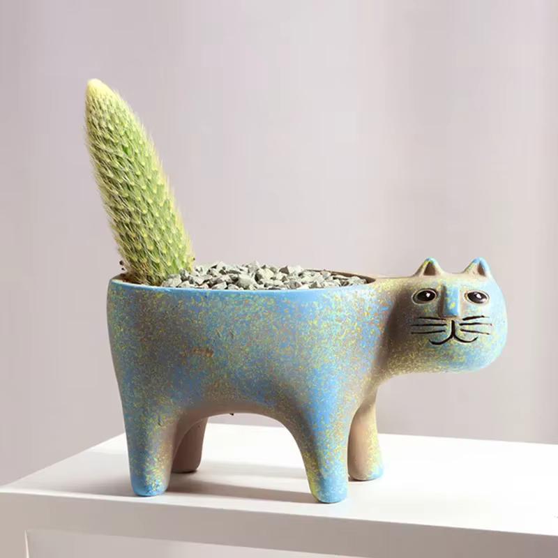 Pot de fleur en céramique de chat mignon