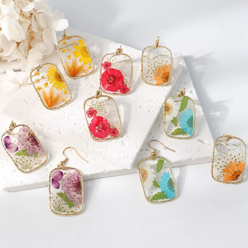 Boucles d'oreilles géométriques en résine époxy avec fleurs séchées, faites à la main, bijoux naturels personnalisés en gros