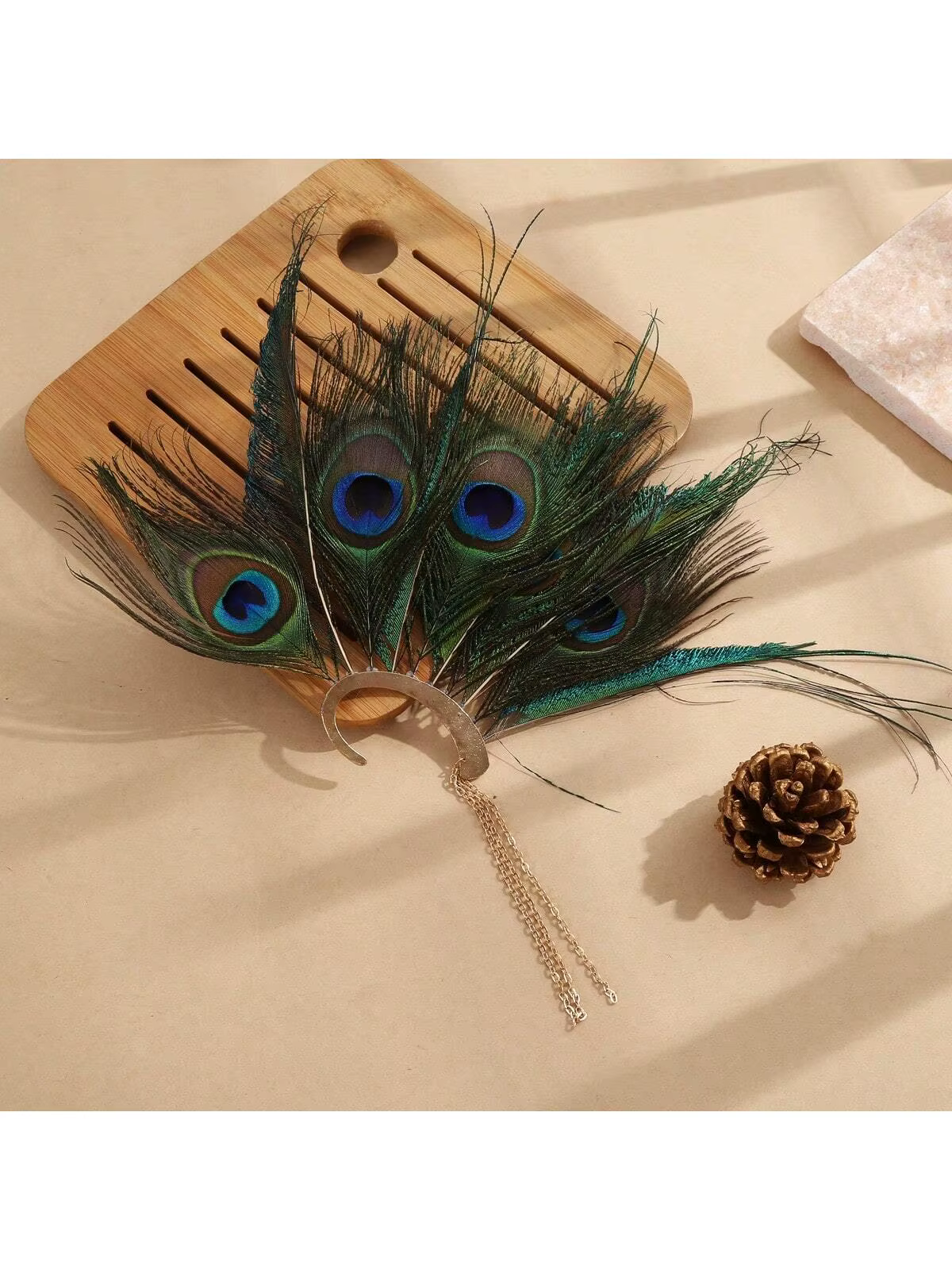 Manchette d'oreille paon
