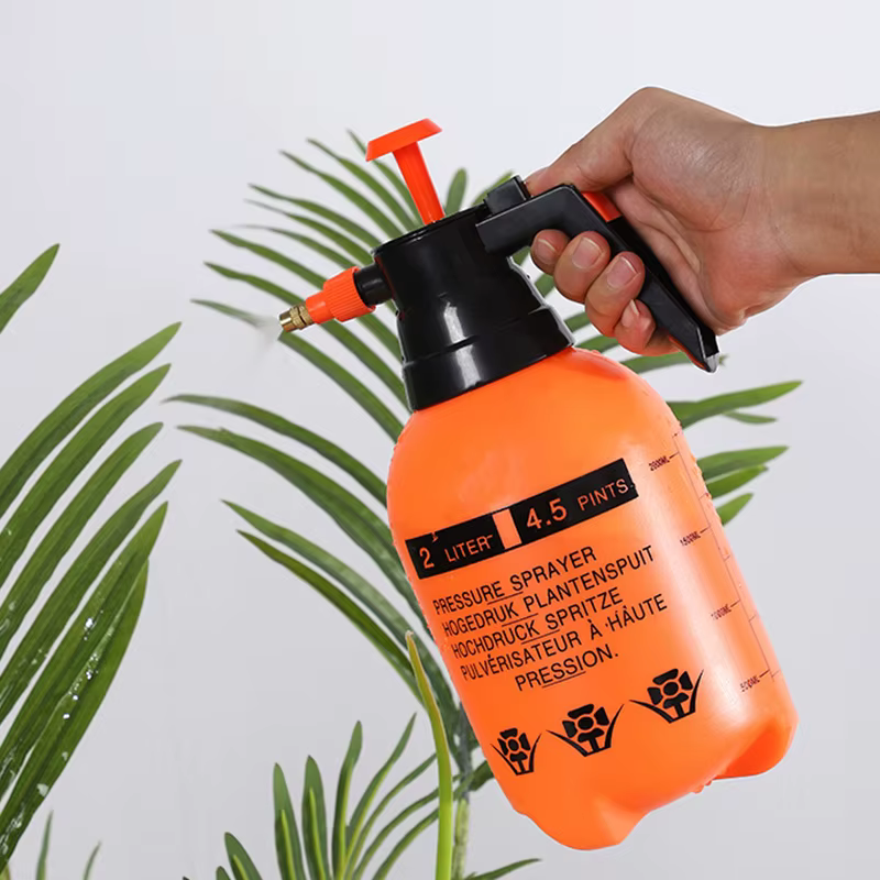 Arrosoir épais domestique pour l'arrosage des fleurs