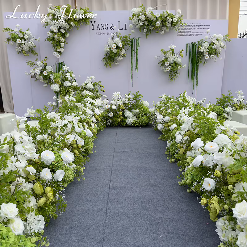 Décoration de mariage avec fleurs artificielles blanches et vertes