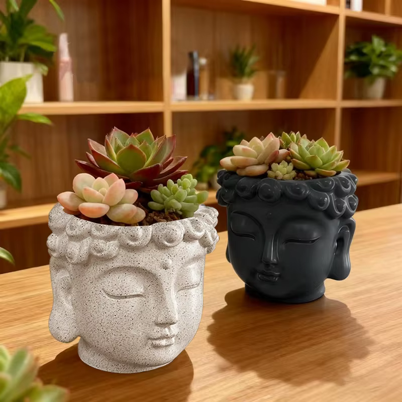 Pot de fleurs en forme de visage de Bouddha