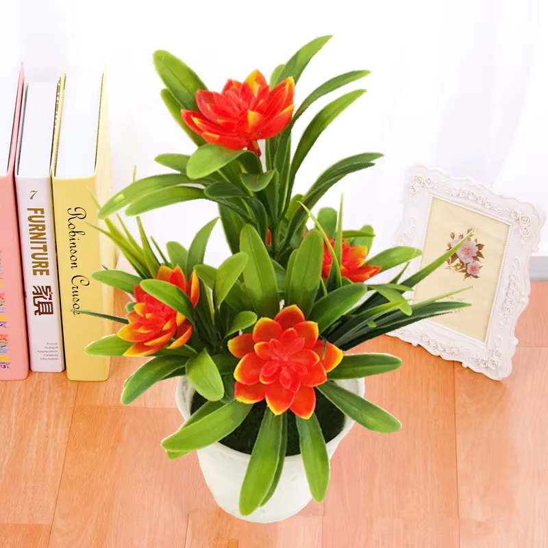 Pot de plantes à fleurs artificielles