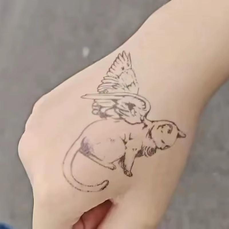 Tatouage temporaire à base de plantes ange chat mignon pour femmes homme bras Semi Permanent Art corporel faux tatouage imperméable ailes de chaton autocollant