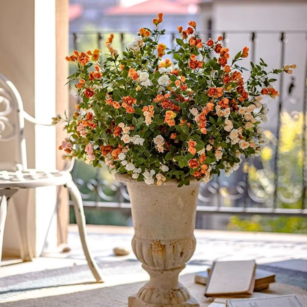 Fleurs artificielles de camélia et de marguerite pour les fêtes