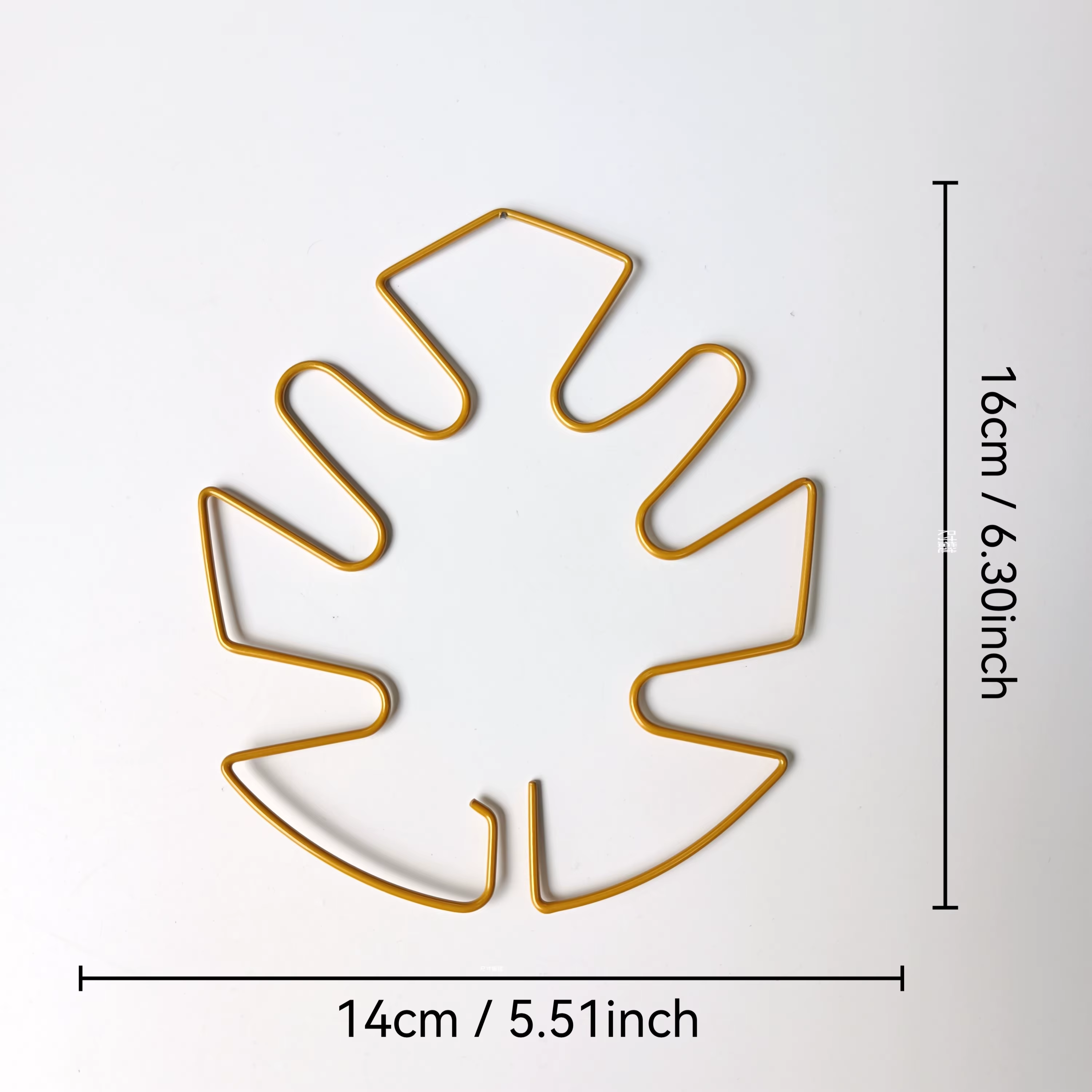 Support de plante en métal en forme de feuille de Monstera