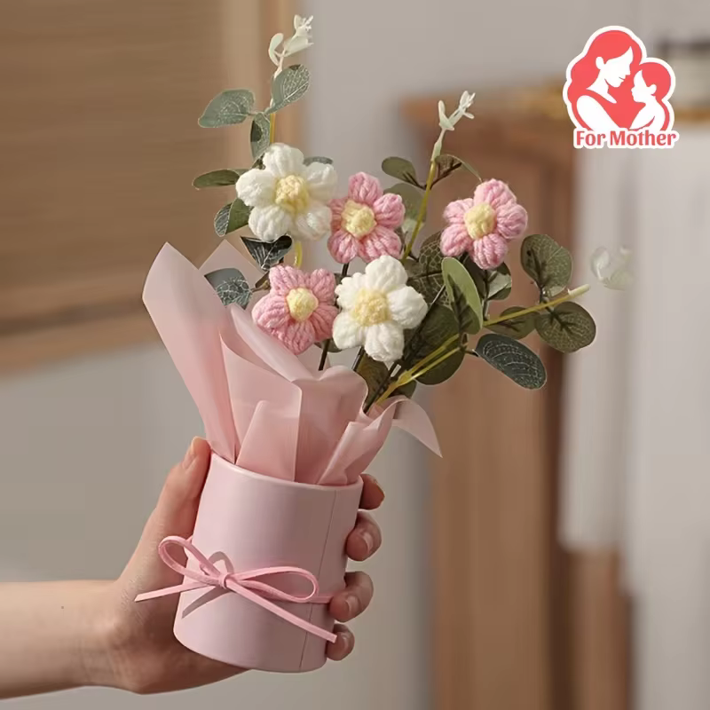 Bouquet fait main avec vase rose comprenant 5 fleurs au crochet