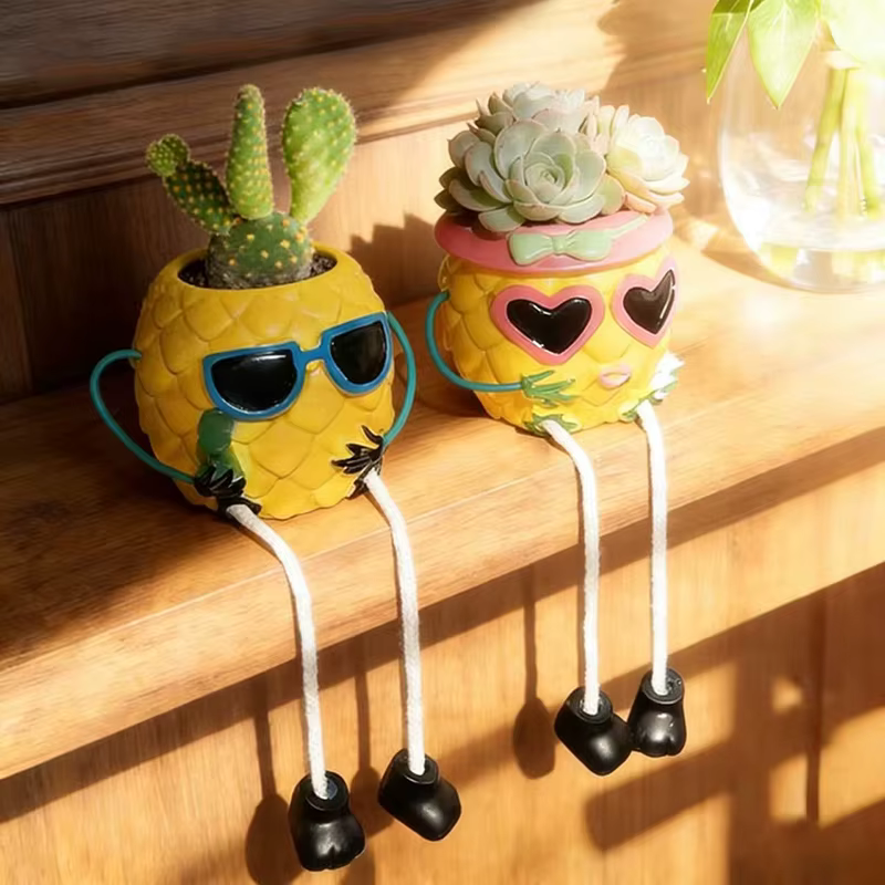 Pot de fleurs créatif en forme de lunettes de soleil et d'ananas