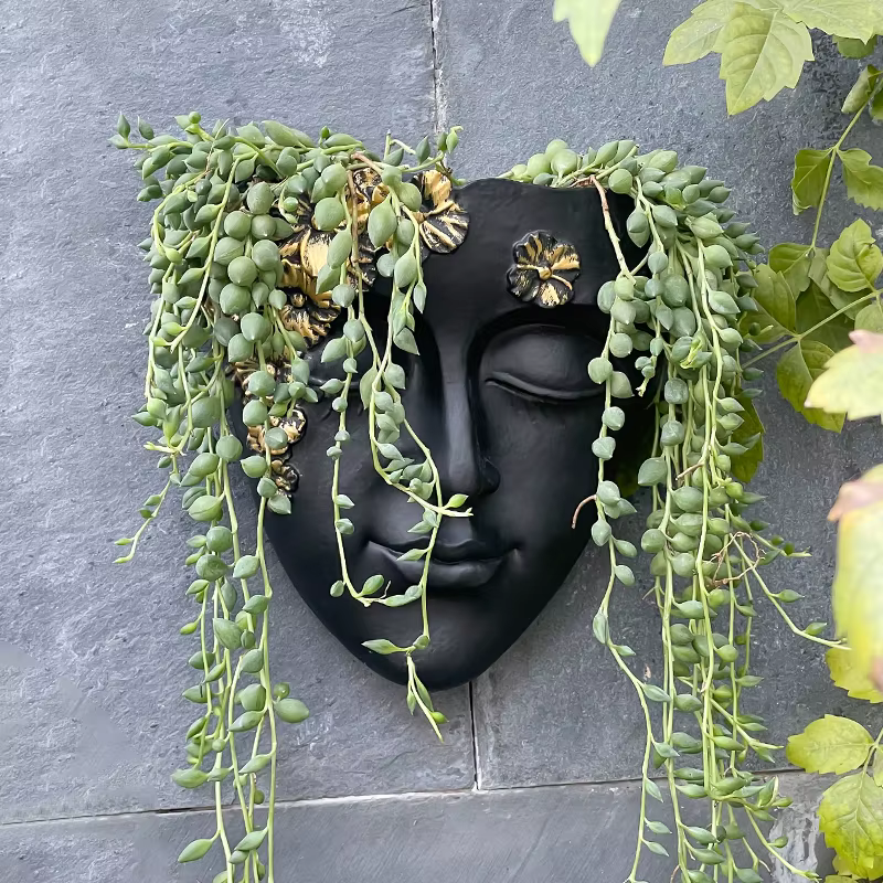 Pot de fleurs mural créatif en forme de visage