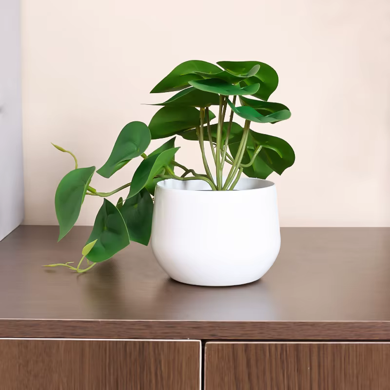Plante simulée en pot, bureau d'affaires