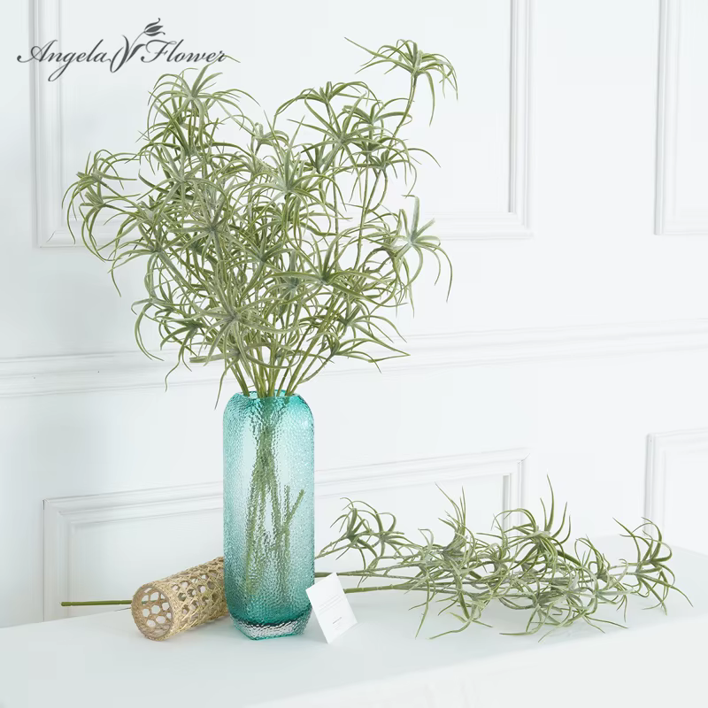 Branches artificielles de plantes vertes