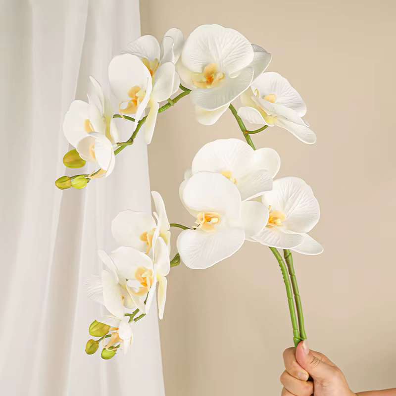 Branche de fleurs artificielles orchidées
