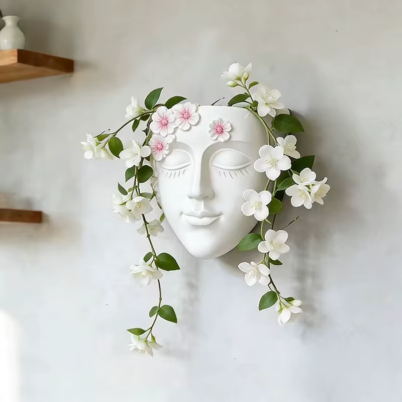 Pot de fleurs mural classique en forme de tête