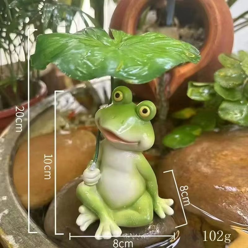 Figurine de grenouille sur feuille en résine