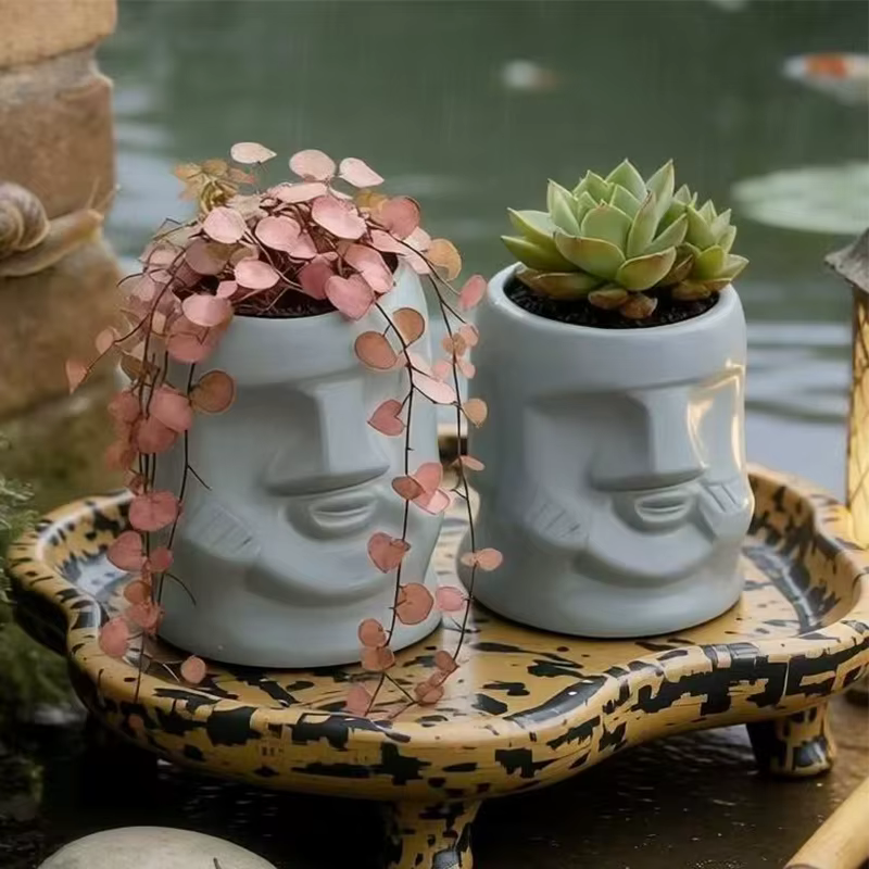 Pot de fleurs en céramique créatif en forme de visage de Moaï