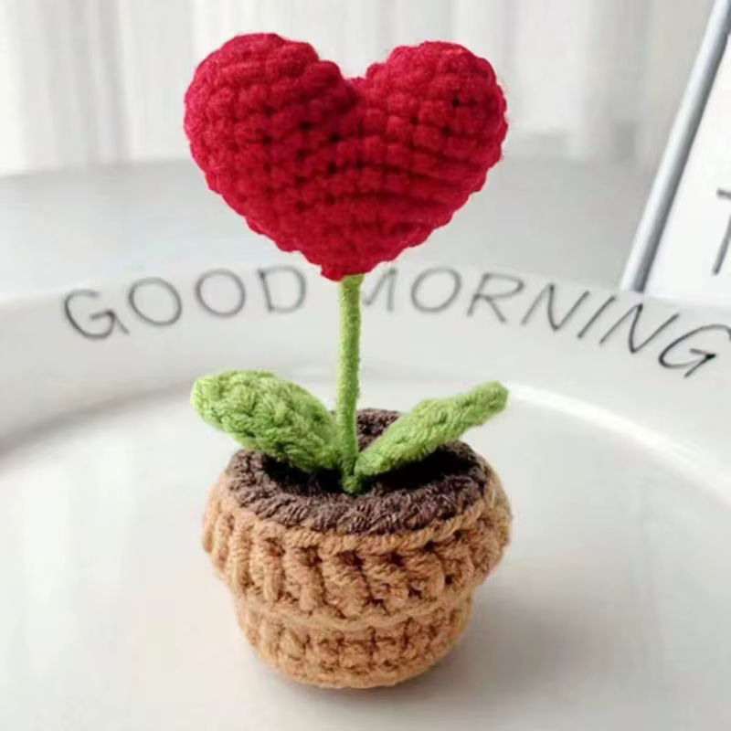 Petite plante en pot tissée à crochet