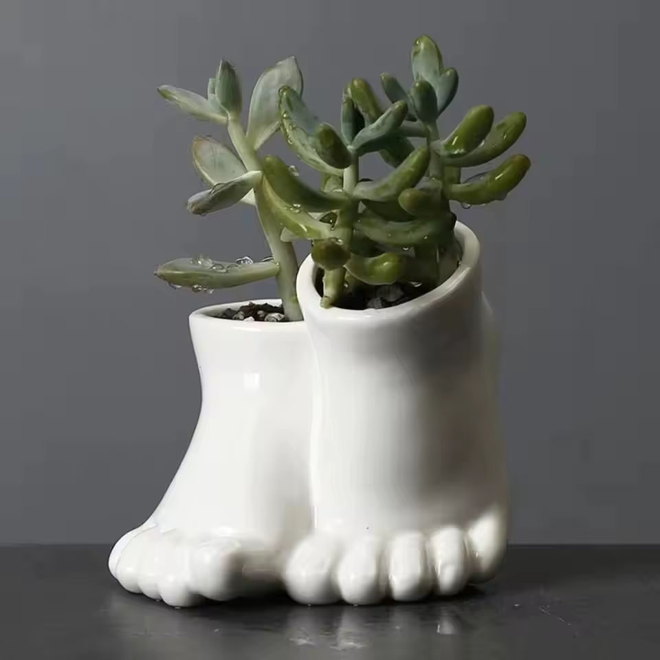 Pot de fleurs en céramique créatif en forme de pied
