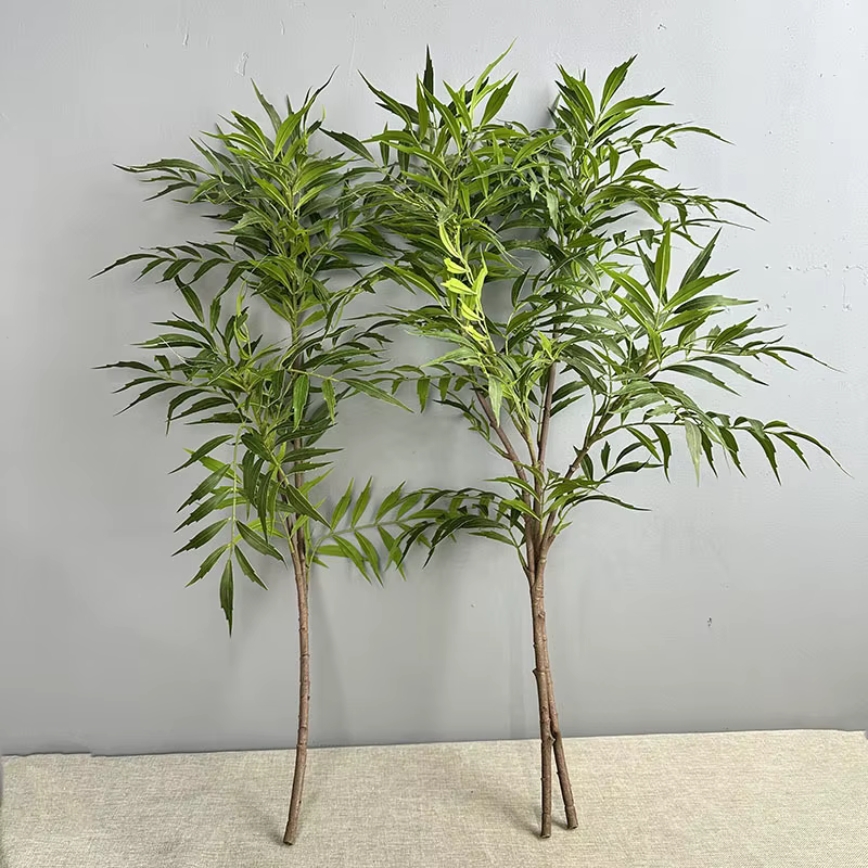 Plantes vertes artificielles en bambou vert réaliste