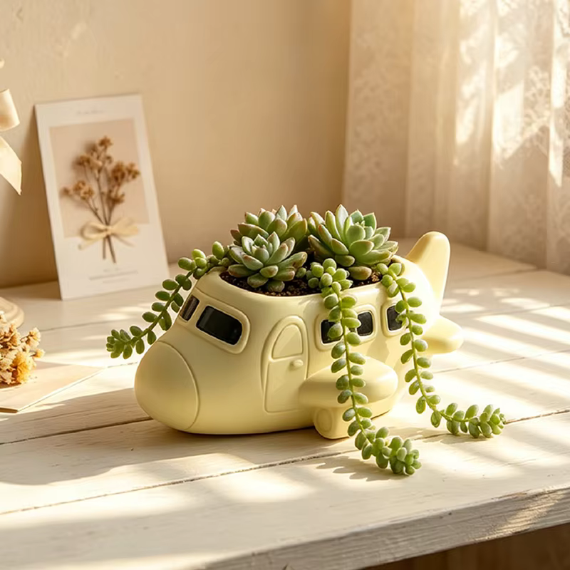 Nouveau pot de fleurs créatif en résine en forme d'avion de dessin animé pour plantes succulentes