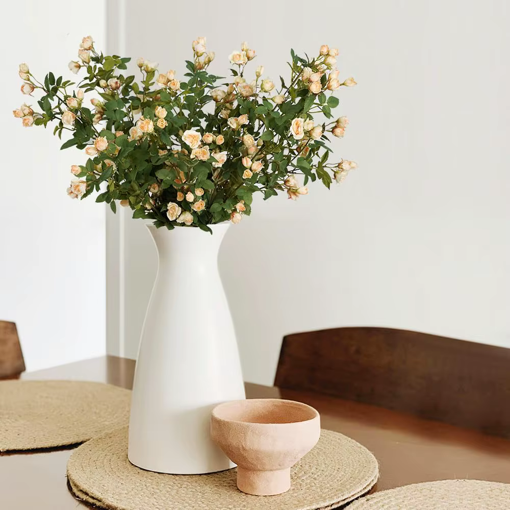 Fleurs artificielles de camélia et de marguerite pour les fêtes