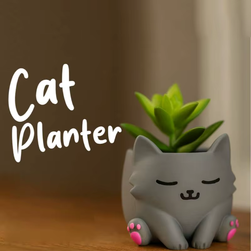 Pot de fleurs en forme de chat mignon