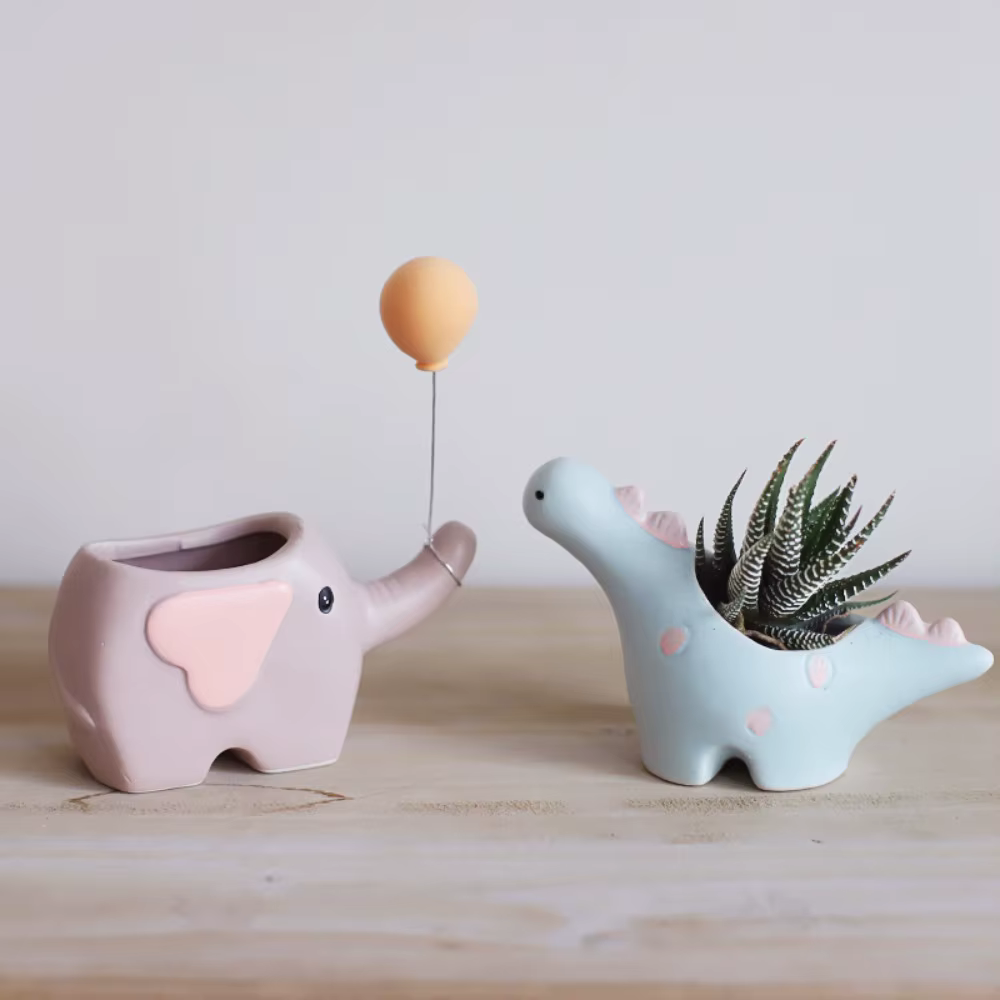 Pot de fleurs en céramique en forme d'éléphant