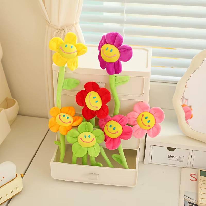 Fleurs en peluche de tournesol souriantes