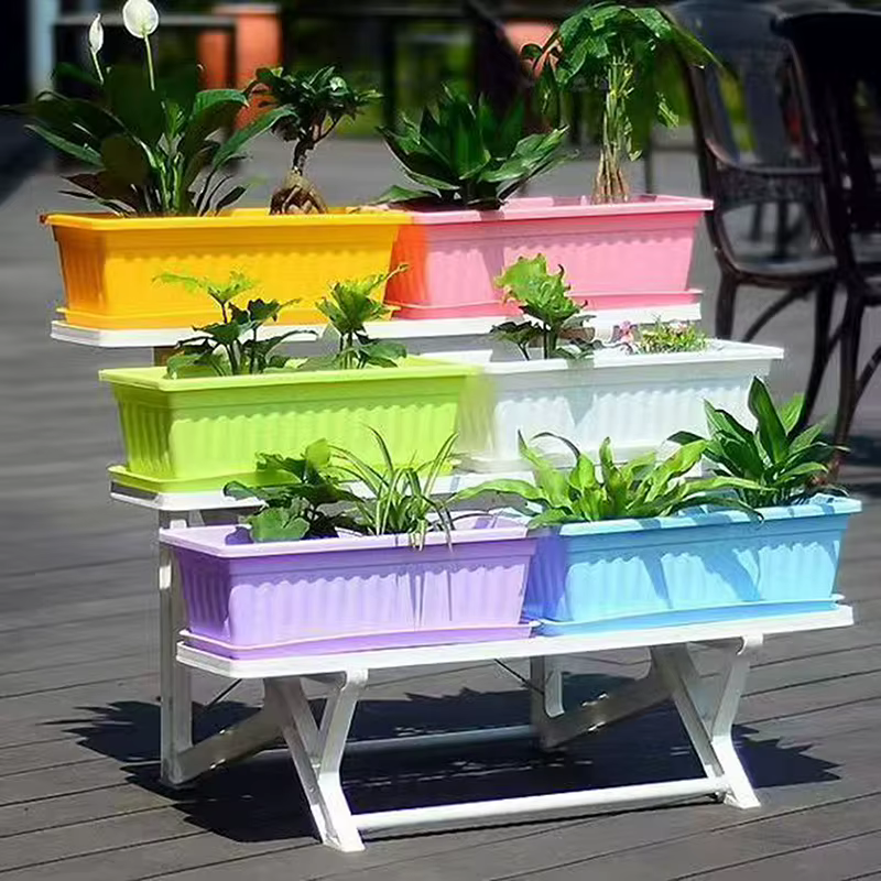 Nouvel ensemble de jardinières modulaires rectangulaires emboîtables avec drainage pour la culture de la laitue et des fraises dans un espace limité