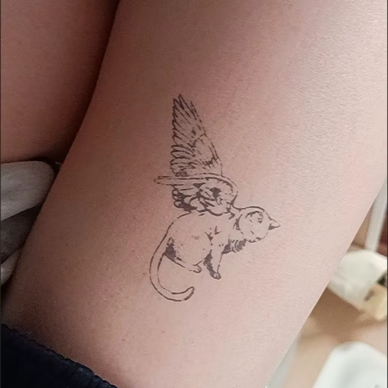 Tatouage temporaire à base de plantes ange chat mignon pour femmes homme bras Semi Permanent Art corporel faux tatouage imperméable ailes de chaton autocollant