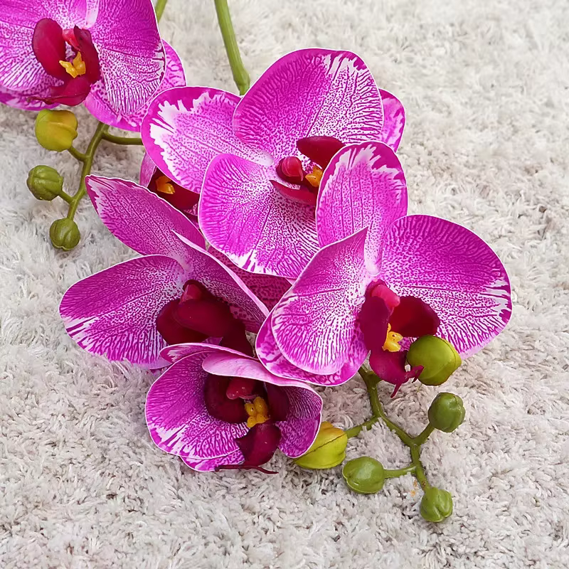Fleurs artificielles orchidées papillon en plastique