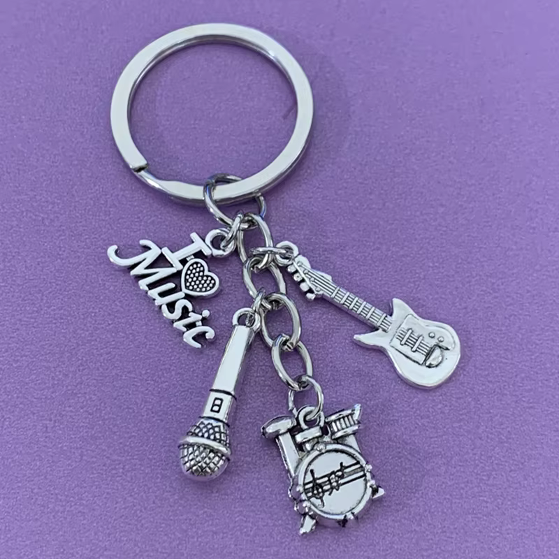 1 pièce de porte-clés en alliage de musique classique, accessoire de décoration de bijoux avec tambour et microphone de guitare